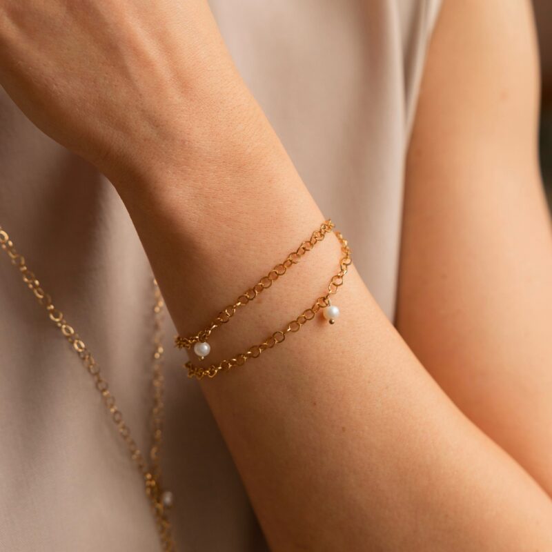 Bransoletka "Pearl drop" - perła słodkowodna, bransoletka ze stali szlachetnej pozłacanej